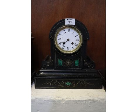 Late 19th Century black slate and marble two train mantel clock with Roman enamel face and French brass drum movement.(B.P. 2