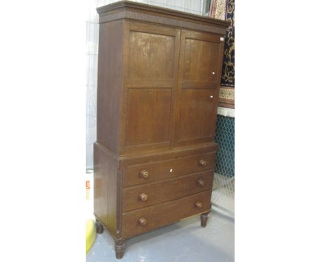 19th Century Welsh oak two stage press cupboard with sliding shelves to the interior and three graduated drawers to the base 