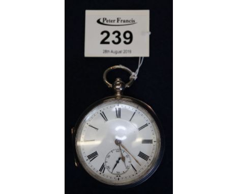 Silver engine turned key wind pocket watch with white enamel Roman face, having seconds dial. (B.P. 24% incl. VAT)