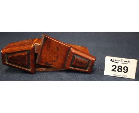 Carved mahogany coffin shaped table snuff box with swivel cover. (B.P. 24% incl. VAT)