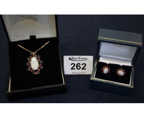 Pair of opal and ruby earrings and an opal and ruby pendant. (B.P. 24% incl. VAT)