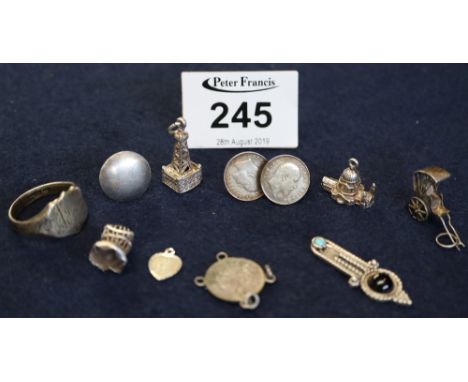 Bag of small silver, charms a ring and other trinkets. (B.P. 24% incl. VAT)