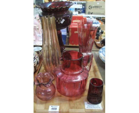 Tray of assorted coloured glass to include; modern cranberry champagne flutes, cranberry glass water jug, ruby lustre vase (n