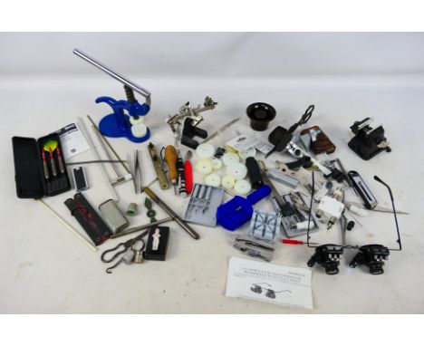 Hand press, magnifying glass, tools - A collection of fine instruments, press and a magnifying tool. (This does not constitut