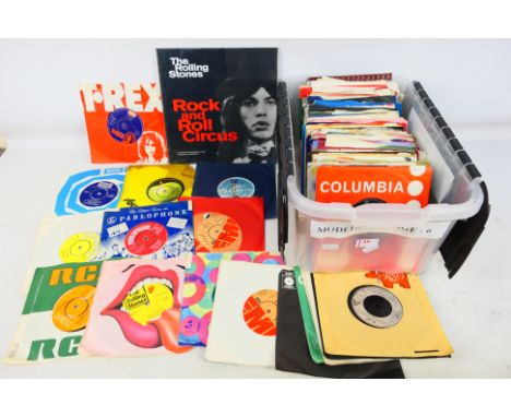 A collection of 7" vinyl records to include ELO, Queen, T Rex, The Beatles, Rolling Stones and other, also included in the lo