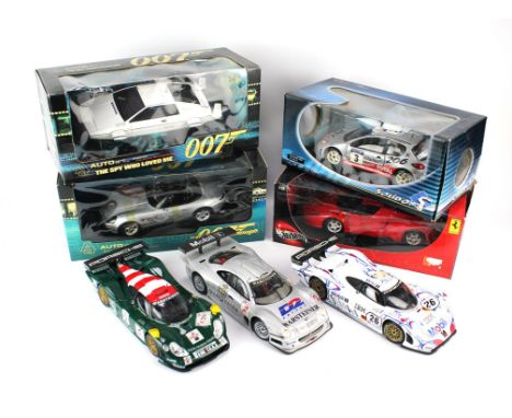 Two Autoart 1:18 scale, James Bond die-cast cars comprising ; BMW Z8 from 'The World is not Enough' and a Lotus Esprit from '