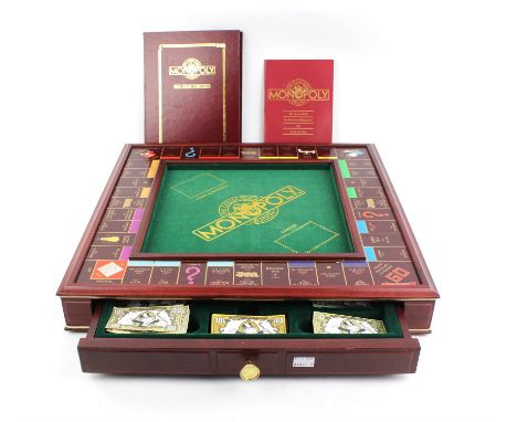 A modern, Franklin Mint 'Monopoly', collectors edition board game. 53cm x 53cm x 8cm