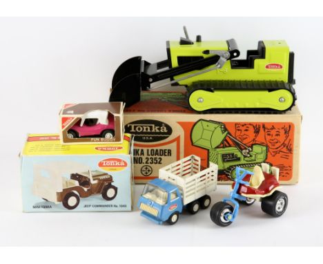 A vintage Tonka Loader No 2352, boxed, a Tonka Jeep Commander No 1040, boxed, a Tonka Fun Buggy No 503, boxed and two further