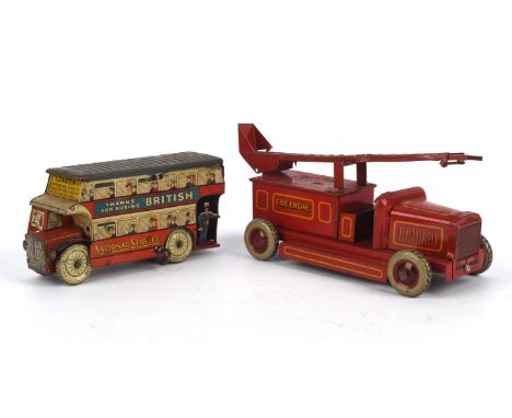 An early 20th century, Wells tinplate c/w Double Decker World Service bus, red with grey roof and tin printed Round the World