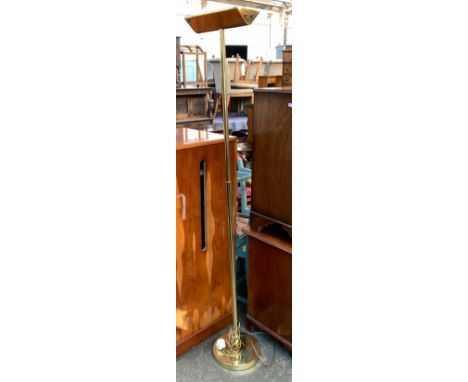 A gilt metal uplighter standard lamp, 182cmH 