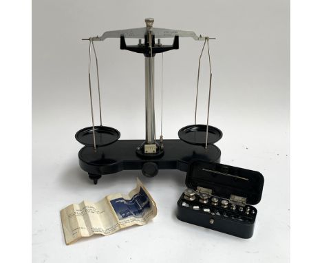 A vintage T-200 student balance, with weights and instructions 