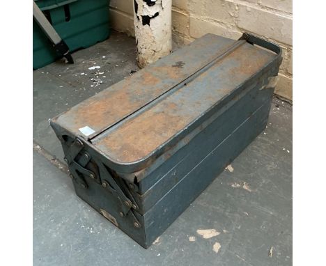 A vintage metal concertina toolbox, containing a quantity of spanners and sockets 