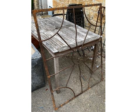 A wrought iron grill, 91x122cm; together with a selection of vintage tools and a cast iron fire surround 