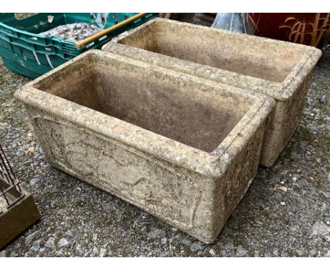 A pair of composite stone trough planters, each 57cmW 