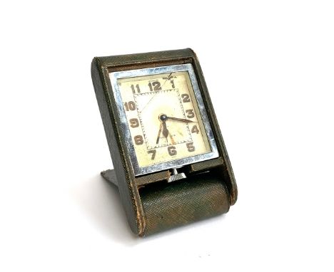 A Le Coultre eight day folding leather travelling clock (af) 