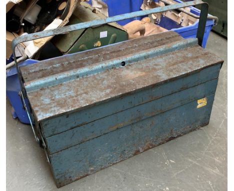 A vintage metal concertina toolbox, containing a large quantity of spanners 