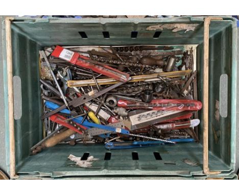 A mixed box of tools, mostly large drillbits 