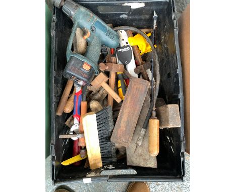 A black plastic crate containing various measuring tools and other vintage hand tools 
