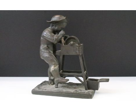 After Charles Louis Menne (1822 - 1894) French 'The knife grinder' modelled as a patinated bronze young man sharpening a knif