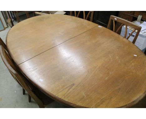 G Plan oval extendable dining table, 72cm high x 162cm long (unextended) x 106cm wide and six chairs (two with arms)