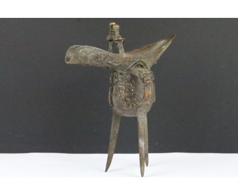 A Chinese bronze three leg jug / Jue, Ritual wine vessel. 