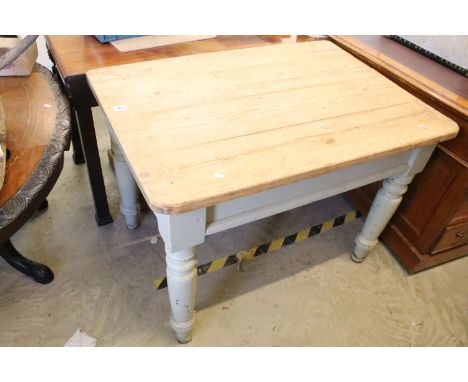 Early 20th century pine kitchen table, on turned tapering legs, 74.5cm high x 107cm wide x 75cm deep 