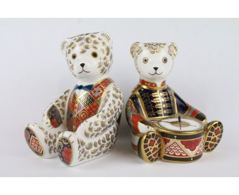 Two Royal Crown Derby paperweights to include Bow Tie Bear and Drummer Bear, with gold stoppers 