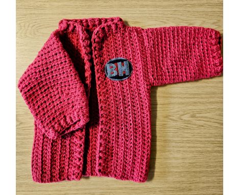 A miniature red Bargain Hunt jacket (approx. for a one year old) hand-crocheted and appliquéd by Bargain Hunt contestants, Na