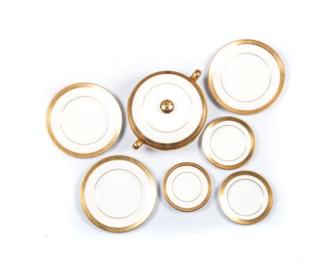 A MINTON ‘BUCKINGHAM’ PATTERN PART DINNER SERVICE, 1926 - 2009 each with crème band and decorative gilt rim against a white g