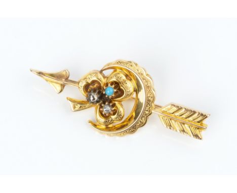 A DIAMOND SET PANEL BROOCH, modelled as an arrow and crescent moon enclosing a three-leaf clover, highlighted with a turquois