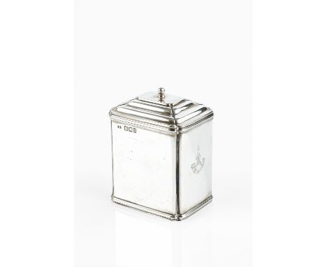 A SILVER RECTANGULAR TEA CADDY, with hinged cover, and re-entrant corners by Garrard &amp; Co Ltd, London 1917, engraved regi