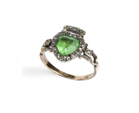 A GEORGIAN EMERALD AND DIAMOND PANEL RING, modelled as a crowned heart, the central heart-shaped emerald in foiled closed-bac