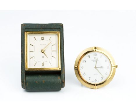 A TRAVEL CLOCK BY JAEGER-LECOULTRE, the rectangular dial with gilt Arabic numerals and baton markers, to a manual wind moveme