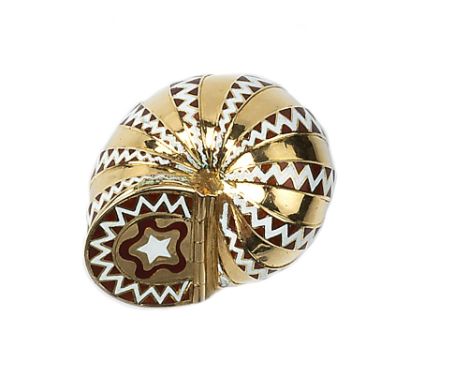 A FRENCH GOLD AND ENAMEL SNUFF BOX, in the form of a nautilus shell, having hinged cover, and bands of red and white zig zag 