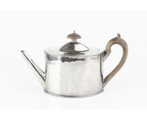 A GEORGE III SILVER TEAPOT, of oval section, having beaded borders, and fruitwood handle and knop, by Benjamin Mountigue, Lon