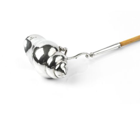 A GEORGE III NOVELTY SILVER LADLE, modelled as a conch shell, with turned ivory handle, by Daniel Denny, London 1791, 35.5cm 