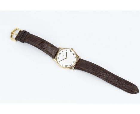 A GENTLEMAN'S WRISTWATCH, the circular white dial with Roman numerals, to a jewelled manual wind movement, the case stamped '