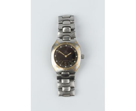 A BI-COLOUR 'POLARIS SEAMASTER' WRISTWATCH BY OMEGA, the circular black dial with dot markers and digital display, to an ETA 