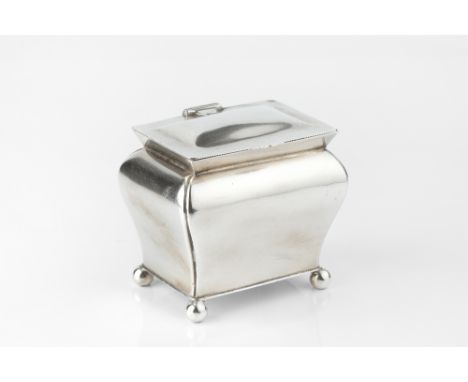 AN EDWARDIAN SILVER TEA CADDY, of rectangular baluster form, with hinged cover, on ball feet, by Martin, Hall &amp; Co, Sheff