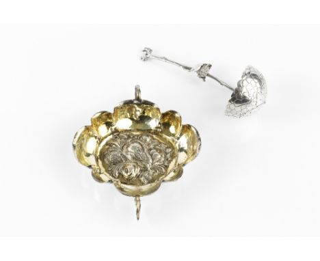 A LATE 19TH CENTURY SILVER STRAINER LADLE, the bowl decorated with overlapping leaves, and having naturalistic handle, marks 