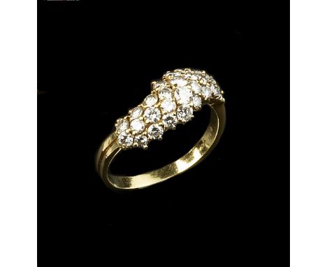 A DIAMOND HALF HOOP RING, designed as a wavy cluster of graduated round brilliant-cut diamonds, yellow precious metal mounted