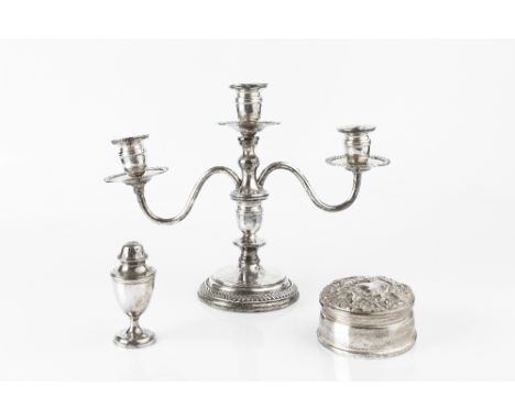 A JAPANESE SILVER THREE LIGHT CANDELABRUM, with gadrooned circular base, by K Uyeda, 21.5cm high (weighted base); a silver sa