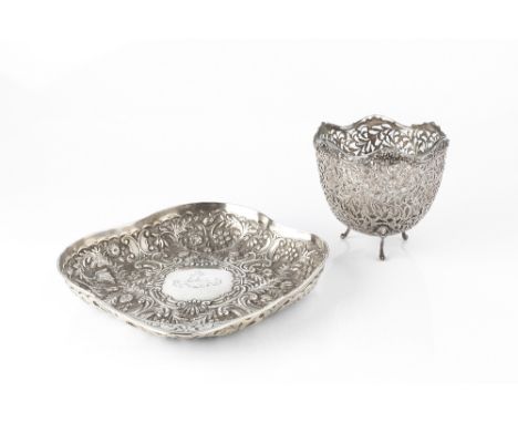 A LATE VICTORIAN SILVER DISH, of shaped outline, repoussé decorated with flowers, foliage and 'C' scrolls, by Wakeley &amp; W
