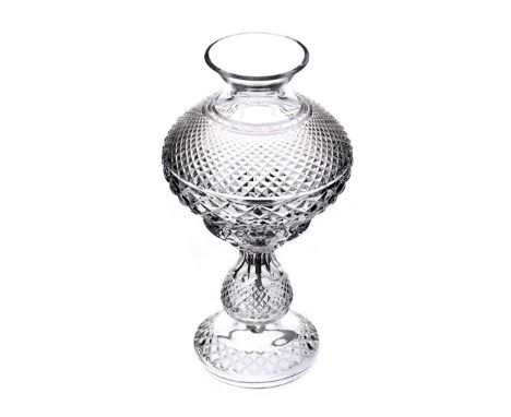 WATERFORD CRYSTAL TABLE LAMP & SHADE.RAISED ON A CIRCULAR FOOT BASE.HEIGHT: 14 INCHES.IN GOOD CONDITION.