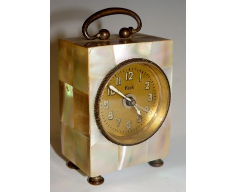 A continental mother of pearl veneered miniature carriage clock with plain handle the brass dial with Arabic numerals inscrib
