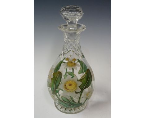 A Richardson cut glass decanter decorated with vitrified enamelled water lilies, leaves and stems, 24cm high, 10cm diameter, 