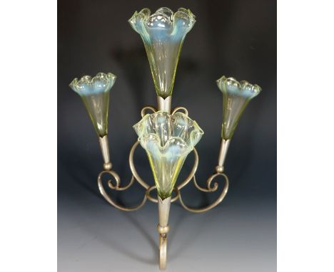 A Victorian vaseline epergne with four flutes on plated stand, frilled edges, colour slightly graduated on each flute from li