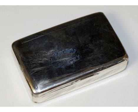A Russian .84 standard rectangular snuff box, the hinged lid and base engraved with church and village, the sides with rudime