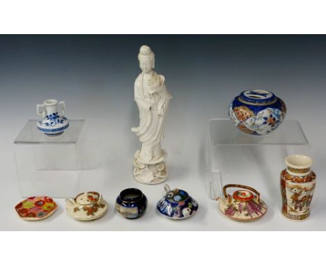 A small quantity of Oriental ceramics including Blanc De Chine figure, 23cm high; two Japanese Satsuma teapots and covers, a 