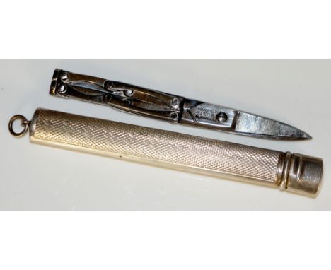 An engine turned silver scissor case of rectangular outline with hinged cover and suspension ring, 9.25cm long by JYC, Birmin
